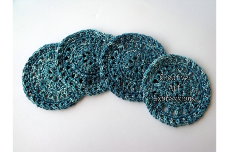 Set of 4 crocheted teal cotton coasters