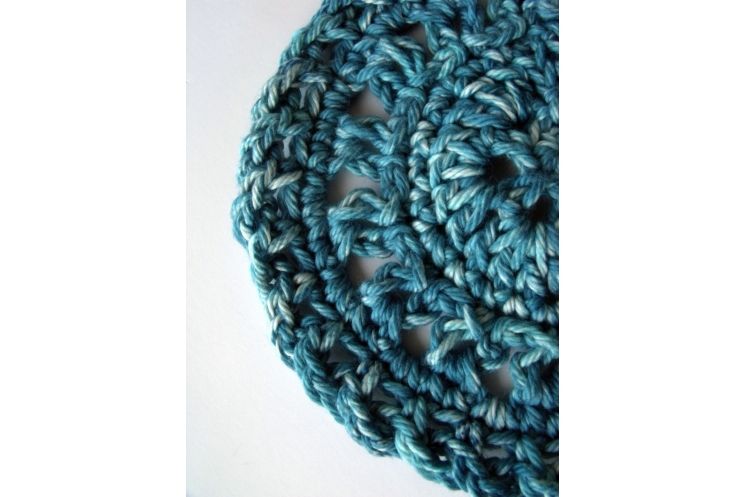 Set of 4 crocheted teal cotton coasters