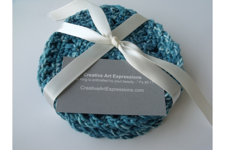 Set of 4 crocheted teal cotton coasters