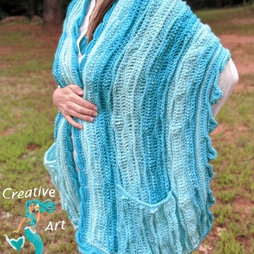 Crocheted Sea Breeze Pocket Shawl Long in Aqua Seas, Women Shawl, Sea Breeze Collection, Mermaid Fashion, Unique Gifts, Handmade Cozies, Handmade Fashion, Mermaid at Heart, Ocean Crochet, Coastal Crochet, Splashing a Sea Breeze, Crochet with Meaning