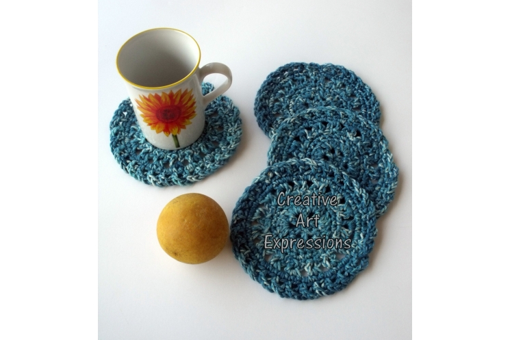 Set of 4 crocheted teal cotton coasters