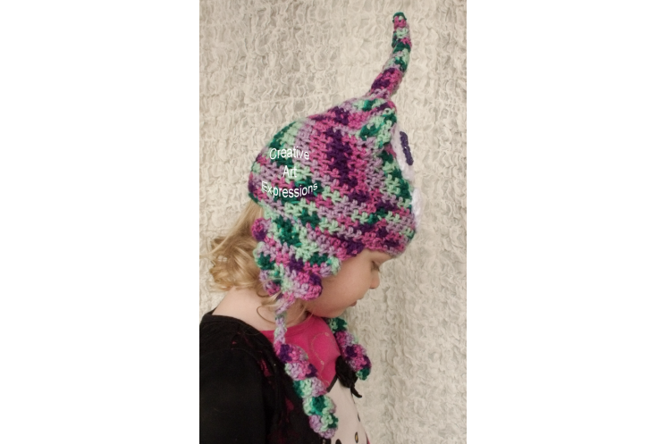 Side of Unicorn Poop Toddler Hat Crocheted Pink Green Purple Mint