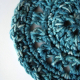 Set of 4 crocheted teal cotton coasters